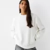 Oversize sweatshirt with side pockets