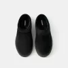 Platform clogs with faux fur lining