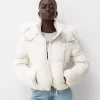 Puffer jacket with faux fur hood