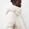 Puffer jacket with faux fur hood