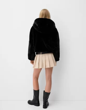 Quilted jacket with faux fur hood