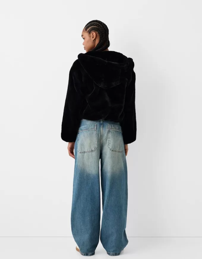 Quilted jacket with faux fur hood