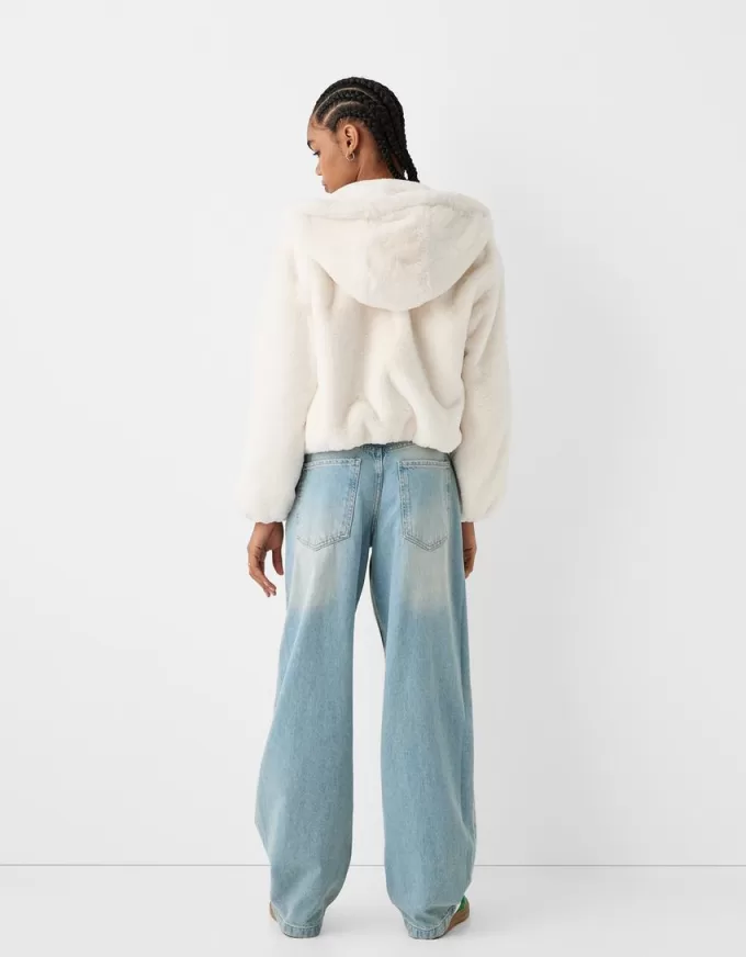 Quilted jacket with faux fur hood