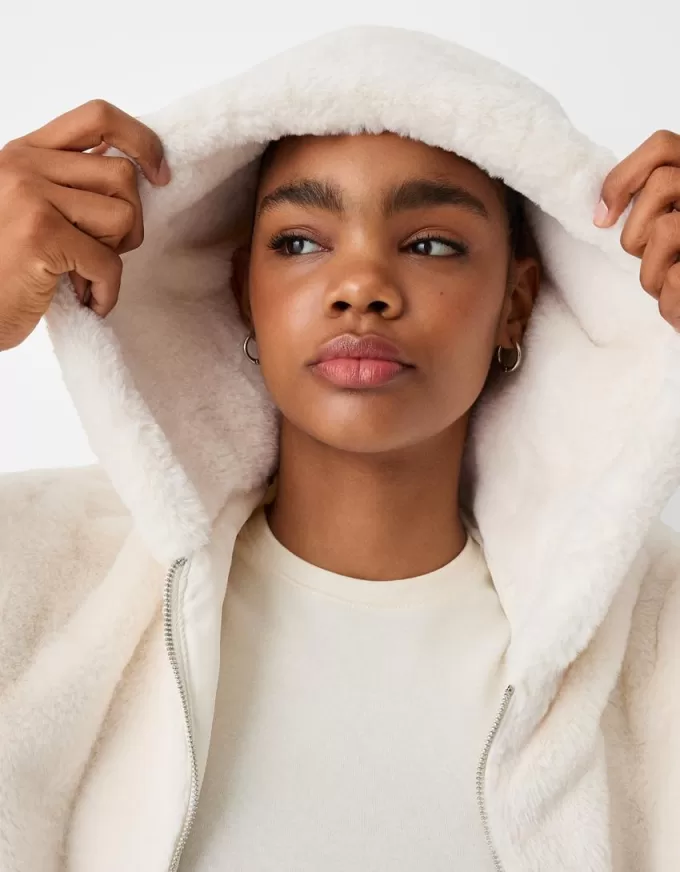 Quilted jacket with faux fur hood