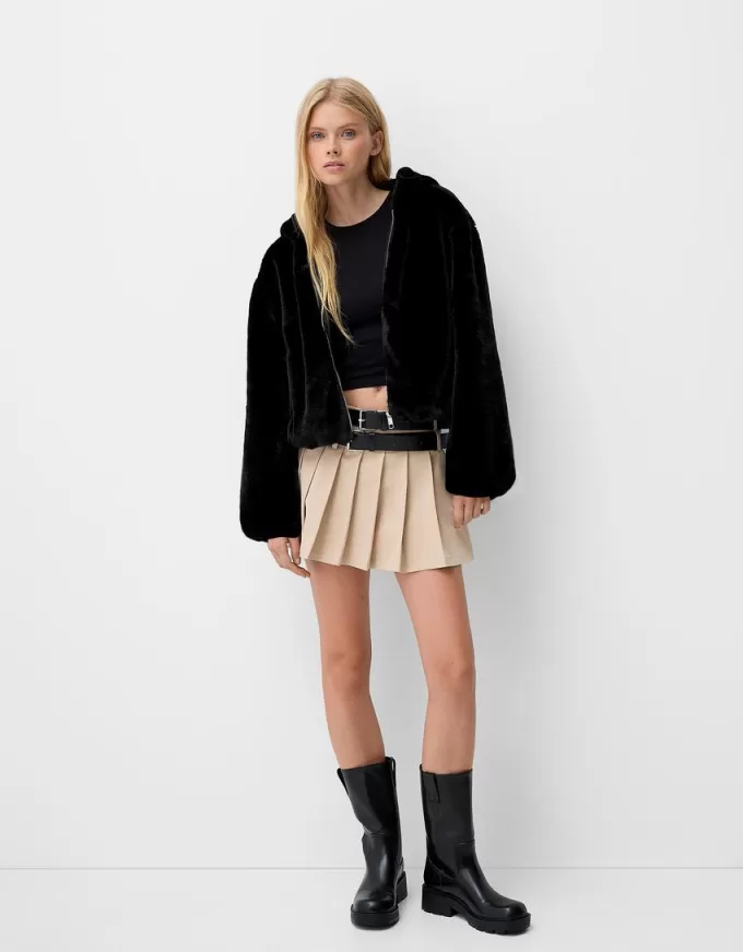 Quilted jacket with faux fur hood