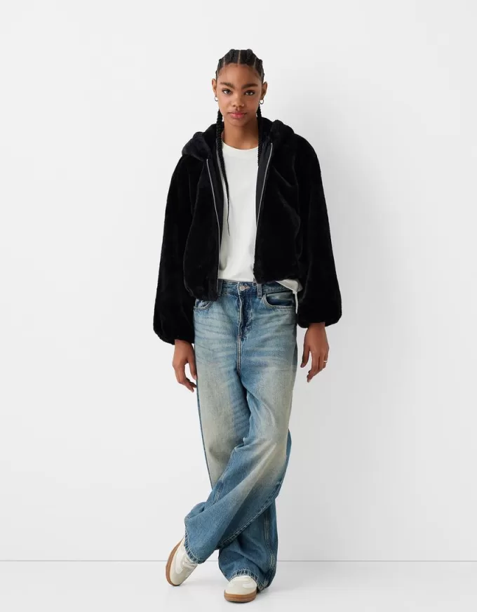 Quilted jacket with faux fur hood