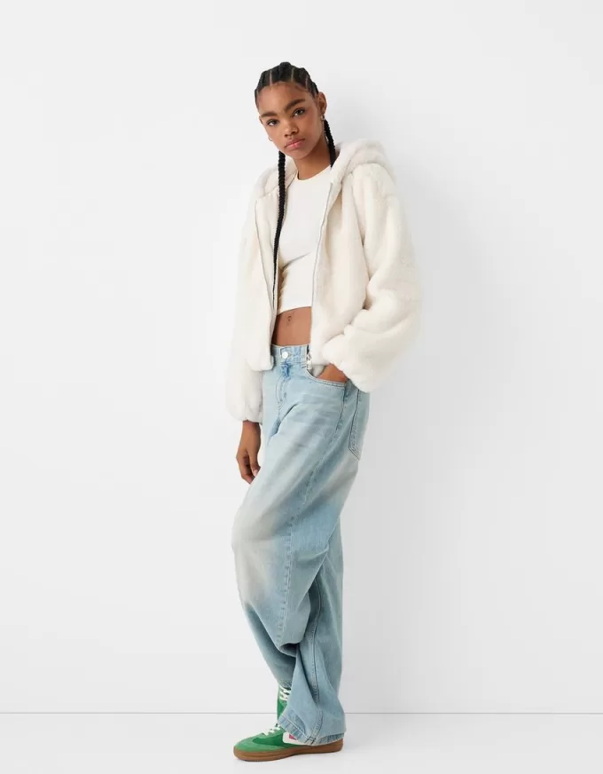 Quilted jacket with faux fur hood