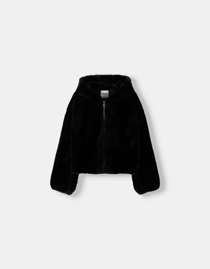 Quilted jacket with faux fur hood