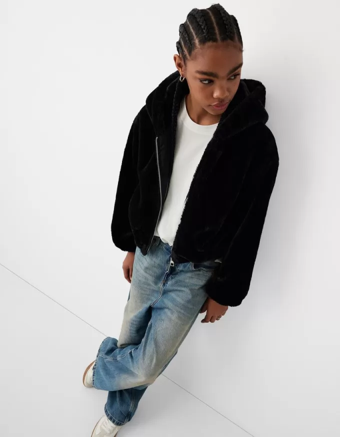 Quilted jacket with faux fur hood