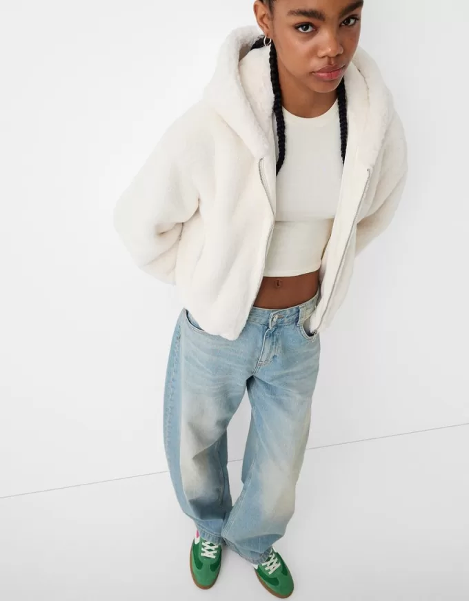 Quilted jacket with faux fur hood