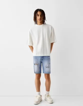 Ripped denim Bermuda shorts