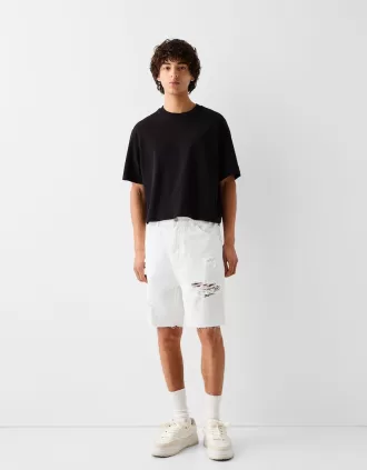 Ripped denim Bermuda shorts