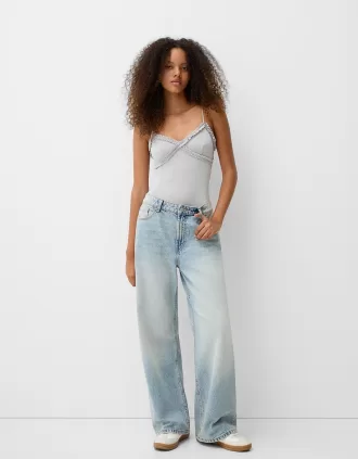 Ruffled bodysuit with straps