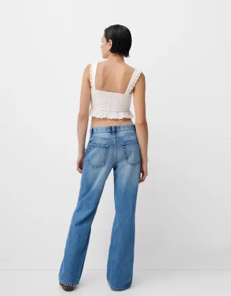 Ruffled top with Swiss embroidery