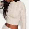 Rustic open knit turtleneck sweater