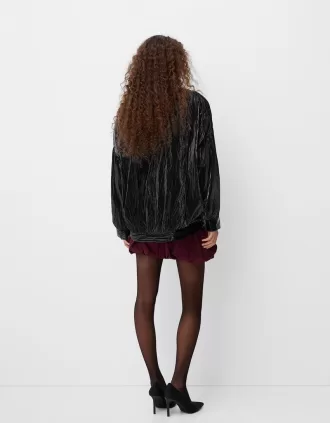 Shiny effect bomber jacket with over print