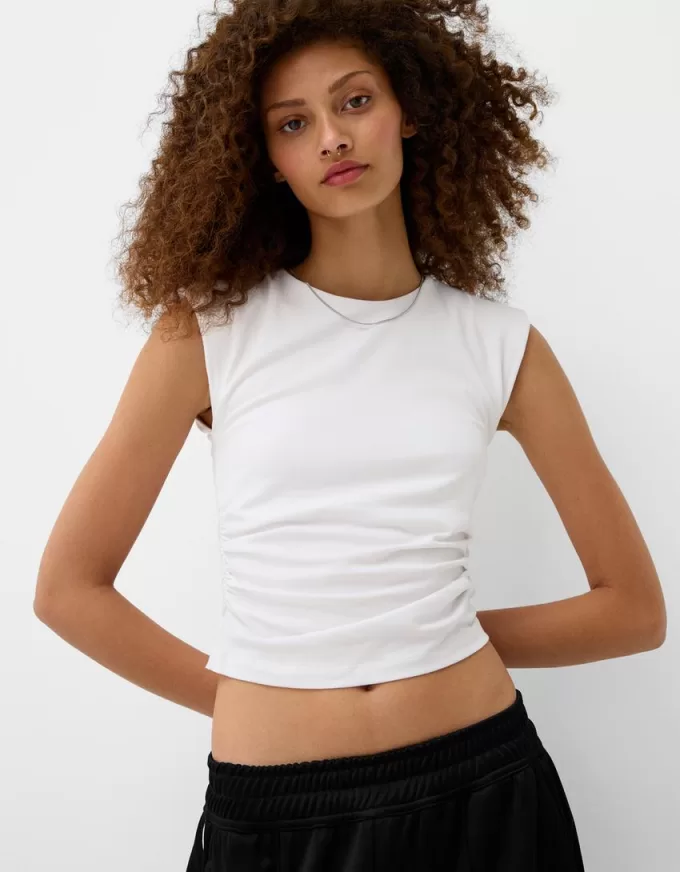 Short sleeve T-shirt with shoulder pads