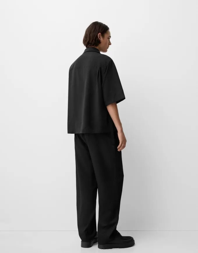 Short sleeve boxy fit crossed shirt with buckle