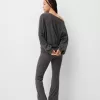 Soft touch asymmetric neck sweater