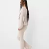 Soft touch asymmetric neck sweater
