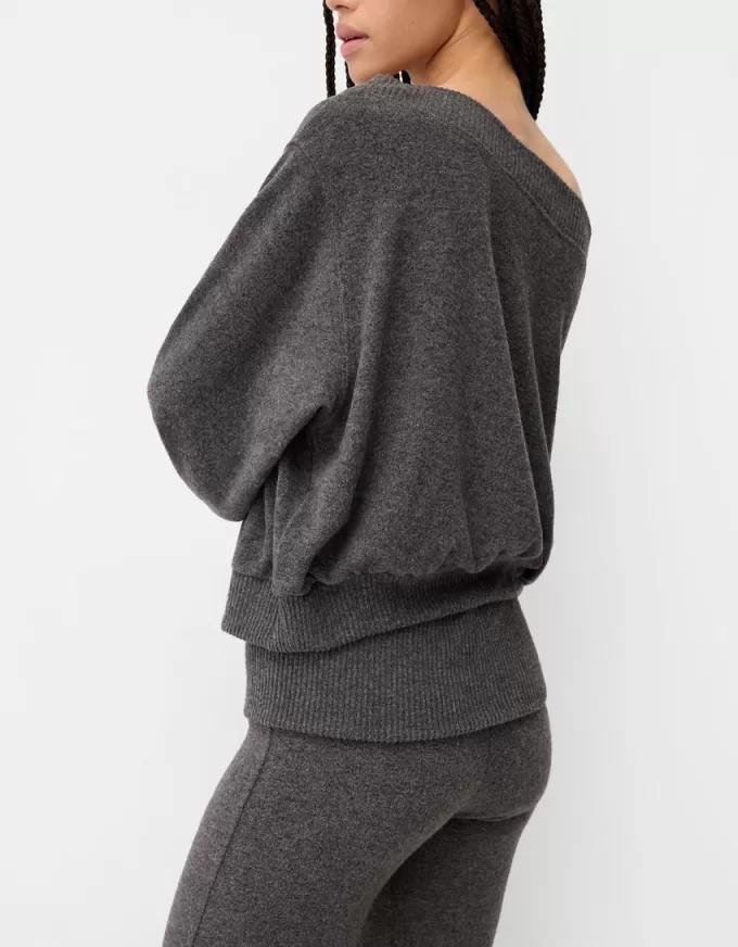 Soft touch asymmetric neck sweater