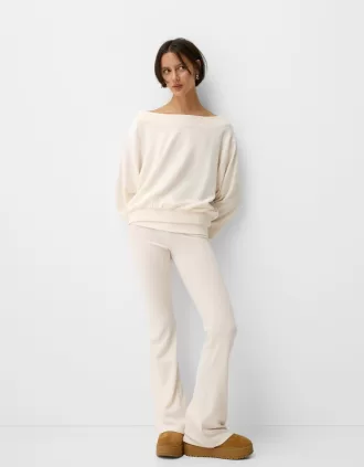 Soft touch flared pants with fold-over waist