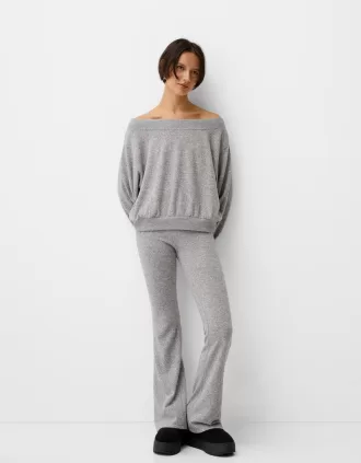 Soft touch flared pants with fold-over waist