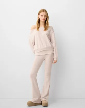 Soft touch flared pants with fold-over waist