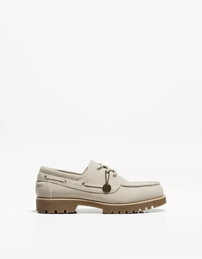 Split leather deck shoes with keyring detail Split leather deck shoes with keyring detail
