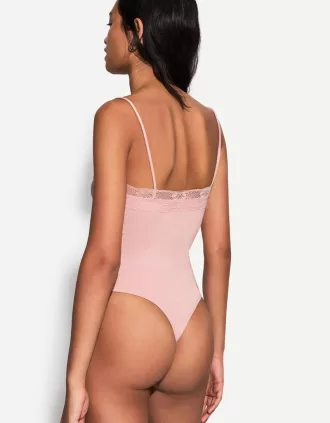 Strappy blonde lace bodysuit