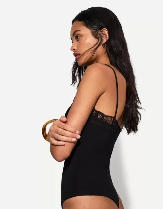 Strappy blonde lace bodysuit