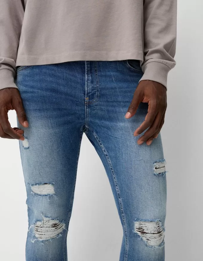 Super skinny ripped jeans