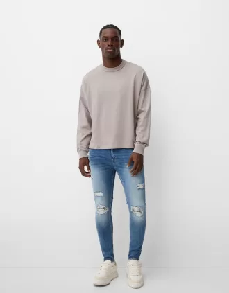 Super skinny ripped jeans