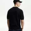 Textured short sleeve polo shirt