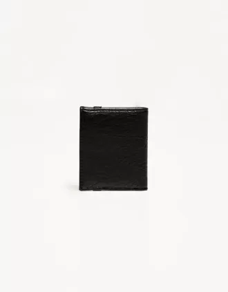 Wallet with elastic closure