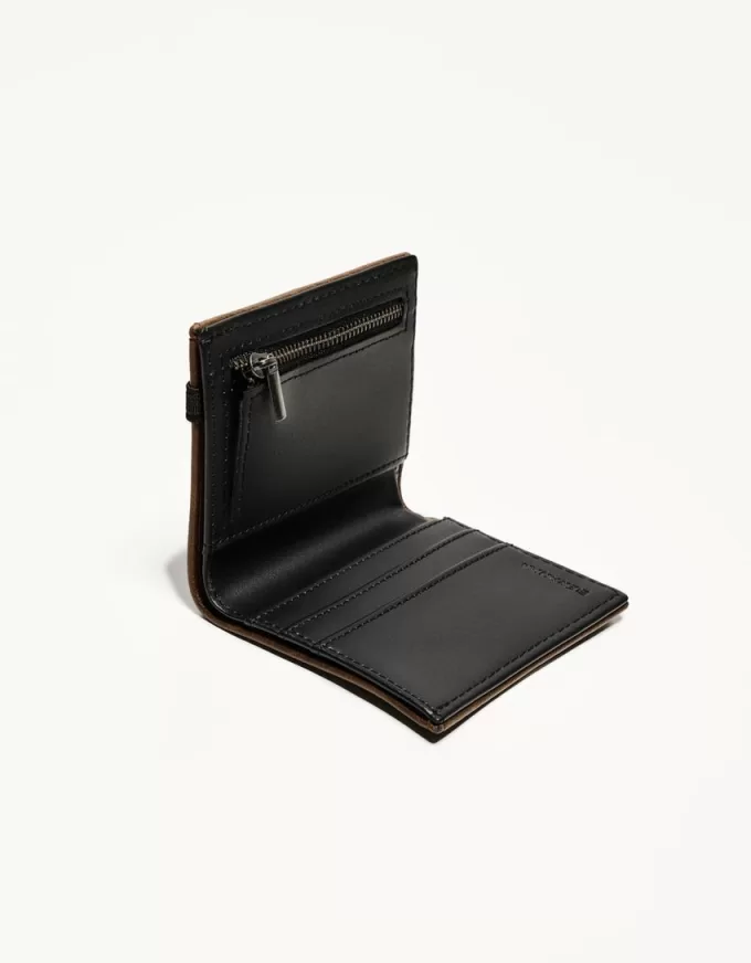 Wallet with elastic closure