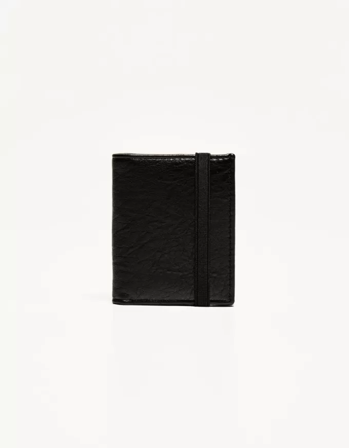 Wallet with elastic closure